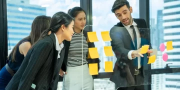 Information System Project Manager versus Project Management Professional